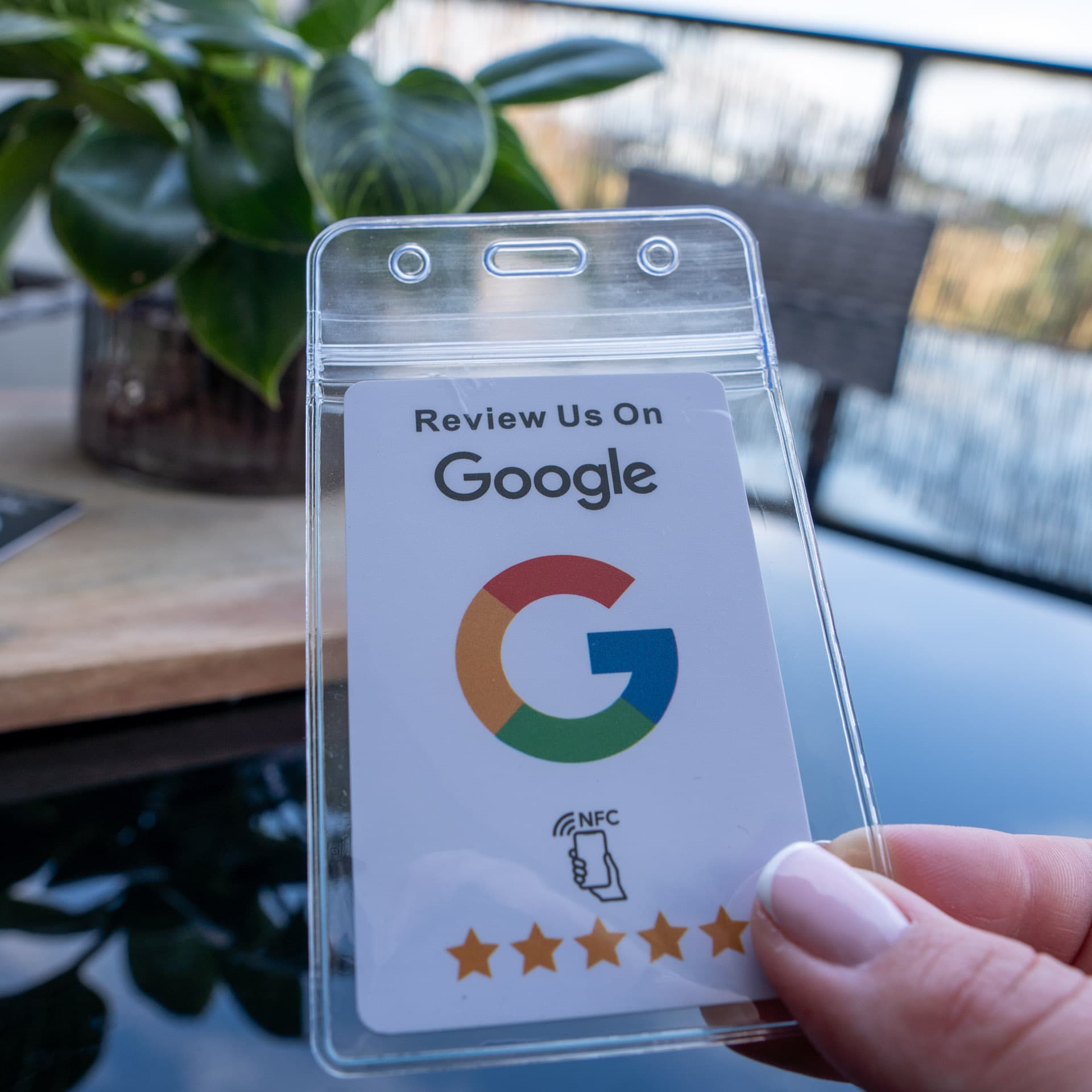 NFC card with protective sleeve and keyring attachment